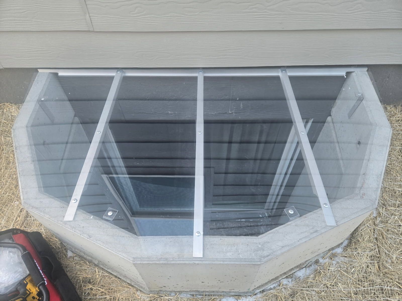 Enhanced Home Safety with Low Profile Window Well Covers Installed